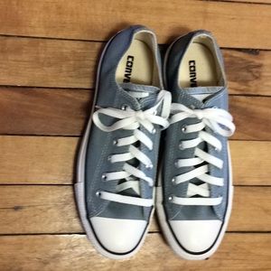 Converse blue canvas shoes.